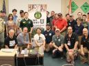 This group of college students, alumni, faculty, and friends gathered for the Collegiate Amateur Radio Initiative Forum at Orlando HamCation, moderated by Andy Milluzzi, KK4LWR (far left, kneeling), of the Gator Amateur Radio Club at the University of Florida, Gainesville, W4DFU. [Bob Inderbitzen, NQ1R, photo]

